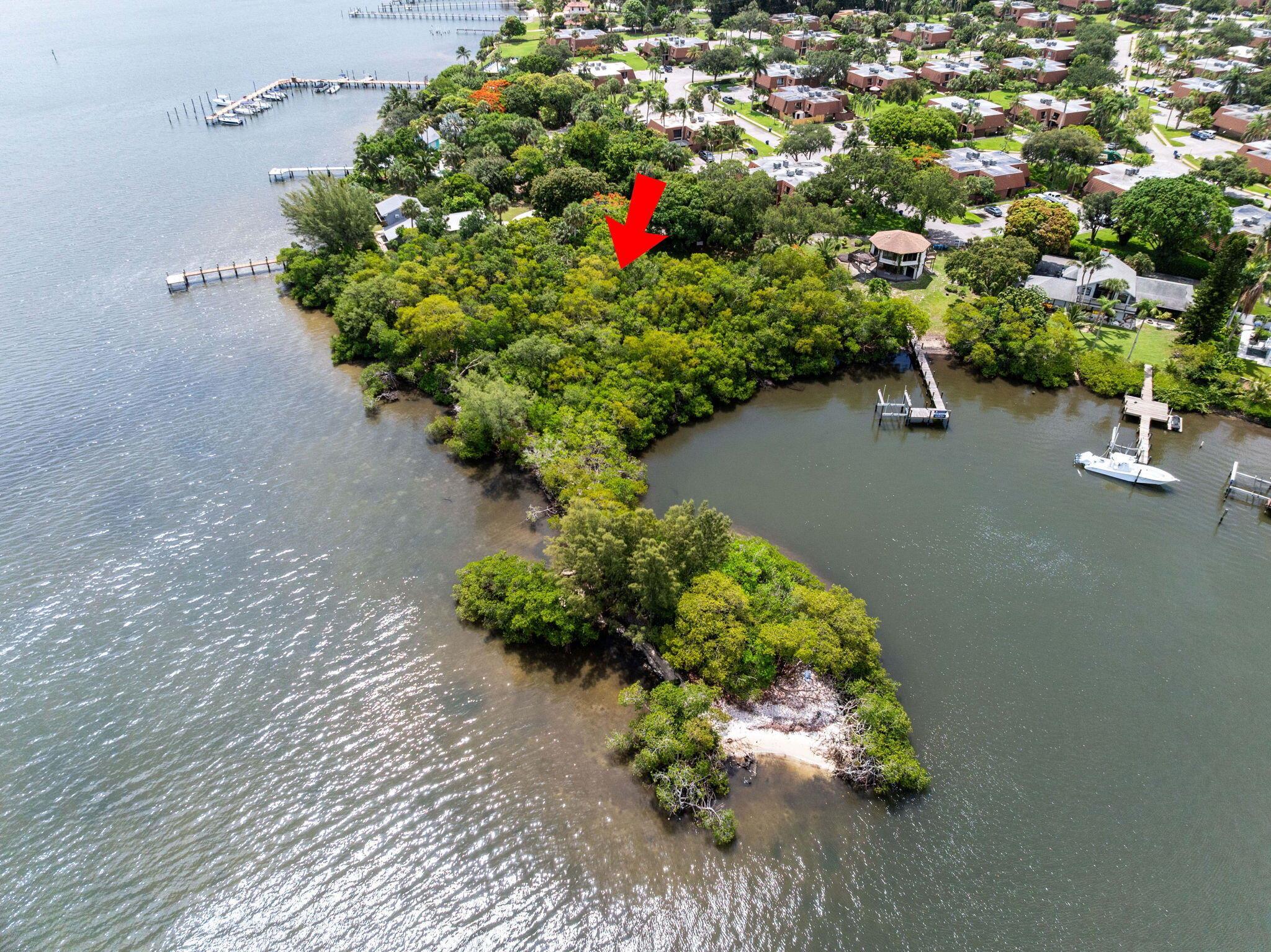 SELLER MOTIVATED. This is the only known property in Jupiter offering over 1,000 ft of private waterfront along the scenic Loxahatchee Rivercomplete with its own private island. A rare opportunity to own one of the most unique land parcels in the area, featuring 69,696 sq ft (1.6 acres) of land with 10,000+ sq ft already cleared. Approximately 5,000-6,000 square feet estimated to be currently buildable (subject to approval, & expandable with variances & mitigation). A DEP permit has been approved for a ~100 ft dock, & a certified expert has confirmed that mangroves on-site may be significantly trimmed to open views & improve usability. With direct access to the water, this property offers unmatched potential for a luxury estate or retreat. Located just minutes from 1000 North..SEE MORE