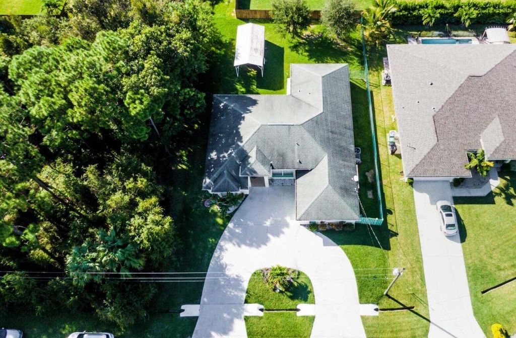 Photo of 1966 SW Gourmet Street, Port Saint Lucie, FL 34953 (MLS # R10882437)