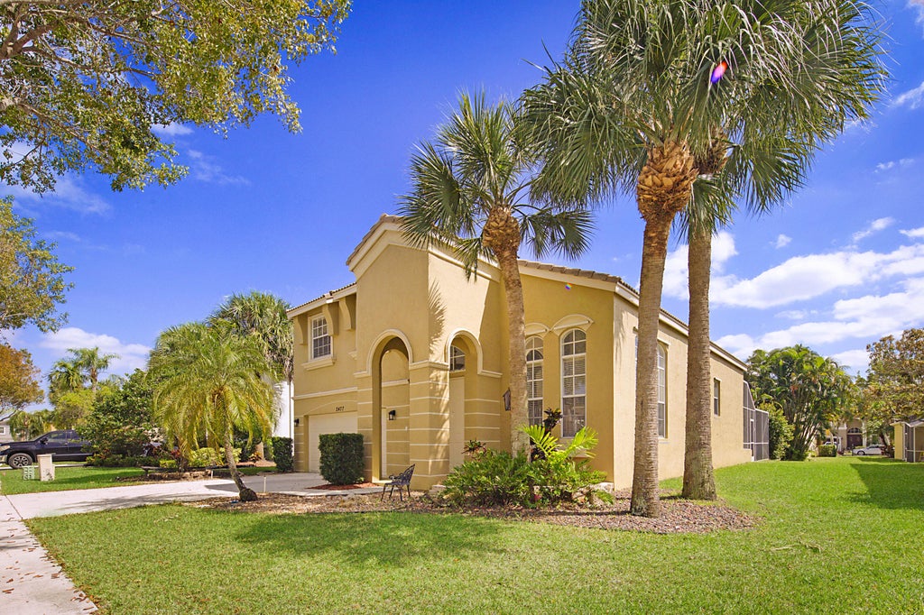 Photo of 2477 Westmont Lane, Royal Palm Beach, FL 33411 (MLS # R10976388)