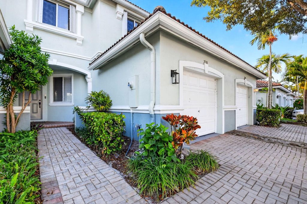 Photo of 2138 Oakmont Drive, Riviera Beach, FL 33404 (MLS # R11159302)