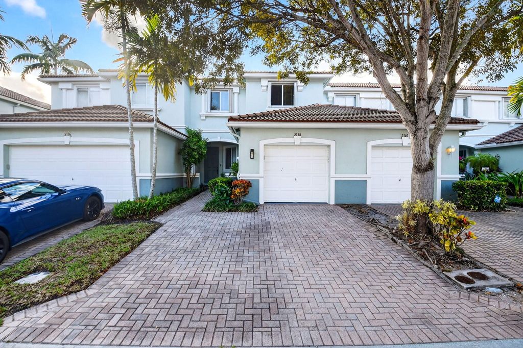Photo of 2138 Oakmont Drive, Riviera Beach, FL 33404 (MLS # R11159302)
