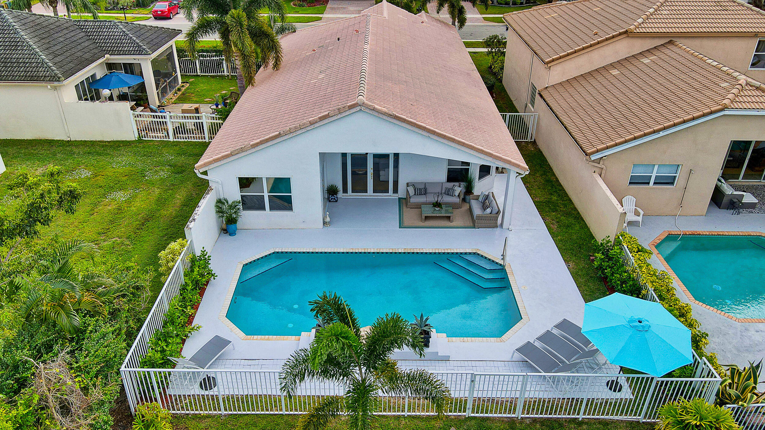 Gorgeous updated 3 bedrooms, 2 baths single-story home with incredible waterfront view and private salt-water heated pool located in sought-after Isles of Wellington! Home features, updated appliances, kitchen with granite counters, high ceilings, and open floorplan. Newly renovated bathrooms, which include master bathroom walk in shower and soaking tub. Community features newly renovated amenities with a brand-new clubhouse, upgraded top of the line gym, stunning clubhouse with large heated pool and spa, tennis and basketball courts. Licensed golf carts allowed. Close to all equestrian activities, Florida Turnpike, Shopping Mall, and a variety of restaurants. A-rated elementary and middle schools! A MUST SEE!