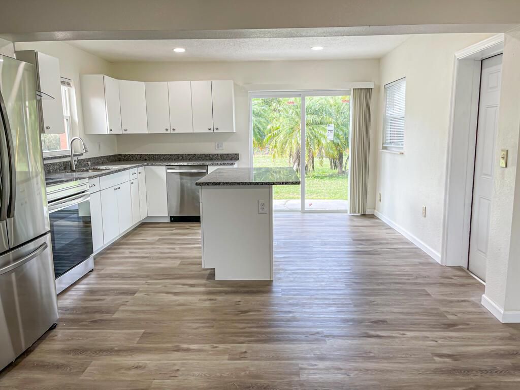 Photo of 138 NW Airoso Boulevard Blvd, Port St Lucie, FL 34983 (MLS # R10764685)