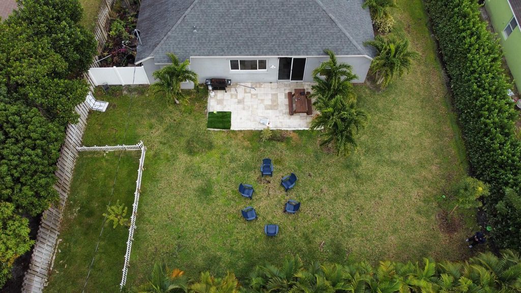 Photo of 958 SE Proctor Lane, Port Saint Lucie, FL 34983 (MLS # R10957053)
