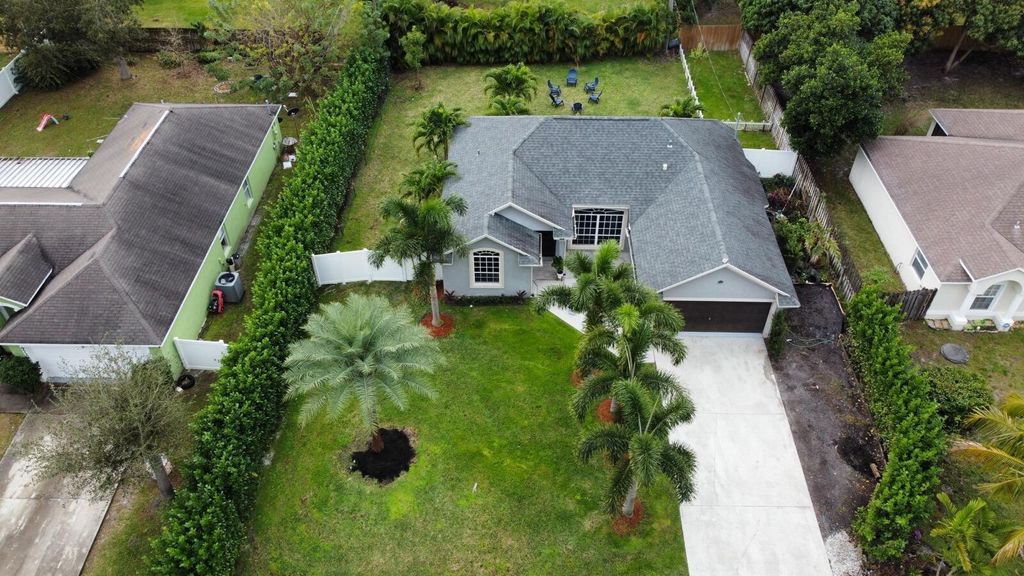 Photo of 958 SE Proctor Lane, Port Saint Lucie, FL 34983 (MLS # R10957053)