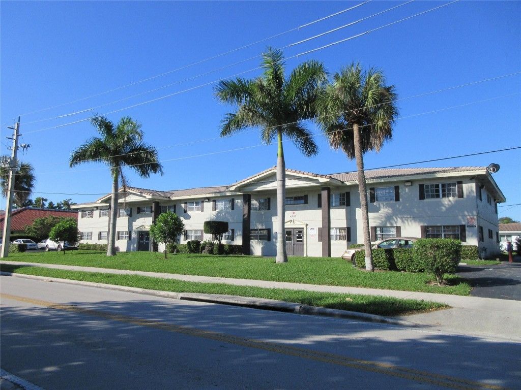 Photo of 4240 Woodside Drive #4, Coral Springs, FL 33065 (MLS # F10541311)