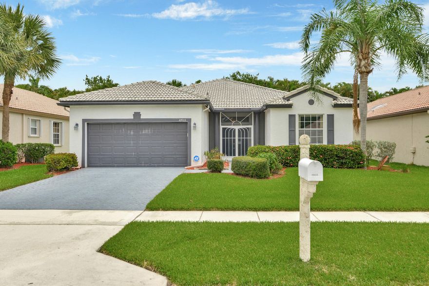 ENJOY YOUR LIFE IN THIS WELL MAINTAINED MAJESTIC ISLES HOME WITH COVERED ENTRANCE, DOUBLE ENTRY DOORS AND VAULTED CEILINGS WITH A SPACIOUS AND BRIGHT OPEN FLOOR PLAN.  EAT IN KITCHEN WITH ENTERTAINMENT/BREAKFAST BAR, LARGE PANTRY. MASTER SUITE FEATURES HIS AND HER MIRRORED WALK-IN CLOSETS, TWIN SINKS, ROMAN TUB AND WALK-IN SHOWER. SLIDING DOORS FROM LIVING ROOM OFFER ACCESS TO COVERED AND SCREENED TILED PATIO WITH BEAUTIFUL BACKYARD WITH LUSH TROPICAL LANDSCAPING. A QUIET PLACE FOR ENJOYMENT AND ENTERTAINMENT.  NEUTRAL CERAMIC TILE THROUGHOUT, CARPETED BEDROOMS. THIS HOME IS CLOSE TO THE FABULOUS NEW 16,000 SQUARE FOOT CLUBHOUSE WITH FITNESS CENTER, PICKLEBALL AND TENNIS COURTS, CRAFT CLASSES, SHOWS, BILLARDS,  OLYMPIC SIZE SWIMMING POOL AND JACUZZI AND MORE. SOMETHING FOR EVERYONE!