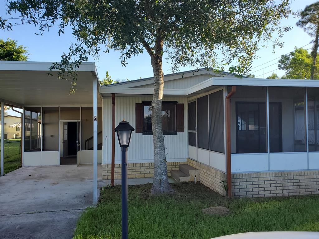 Photo of 2577 SW Toronado Trail, Stuart, FL 34997 (MLS # R10648457)