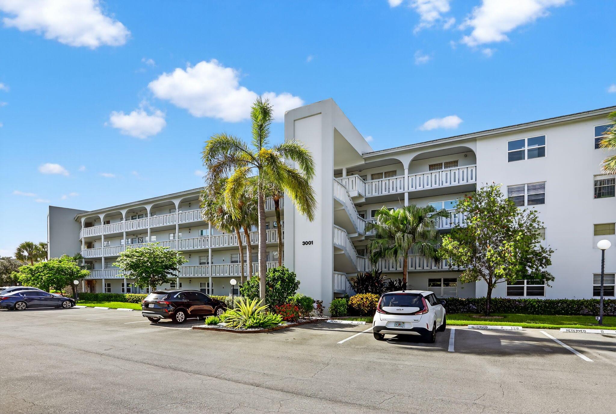 Discover this beautifully renovated 2-bed, 2-bath condo in the vibrant 55+ Wynmoor community! Featuring white cabinetry, vinyl floors, quartz countertops, new stainless steel appliances, new lighting, and spacious walk-in closets, this move-in-ready gem offers a serene garden view just steps from the pool. Enjoy resort-style living in a gated community with an 18-hole golf course, fitness center, tennis courts, and a bustling clubhouse hosting social clubs, yoga, art classes, and live entertainment. Relax at the theater, stroll scenic paths, or use the shuttle service. With 24/7 security and proximity to shopping, dining, and beaches, Wynmoor blends comfort and an active lifestyle. Schedule a tour today!