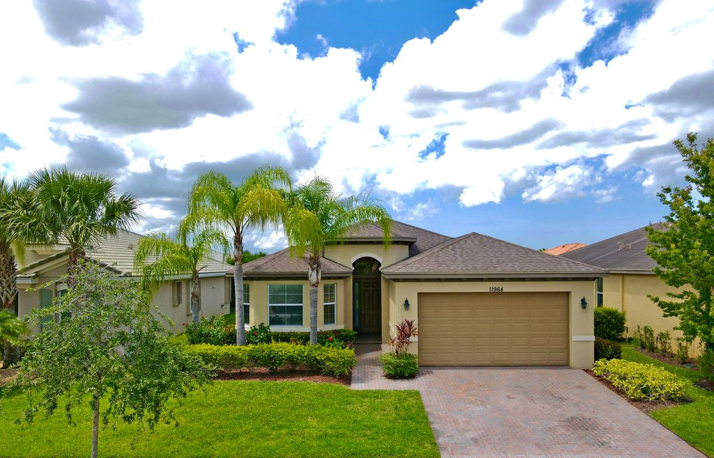 Photo of 11964 SW Crestwood Circle Cir, Port St Lucie, FL 34987 (MLS # R10799290)