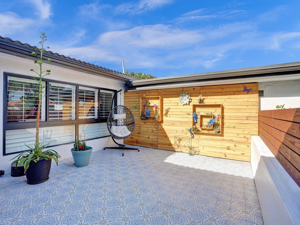 Photo of 1750 NE 48th Court, Oakland Park, FL 33334 (MLS # F10536984)