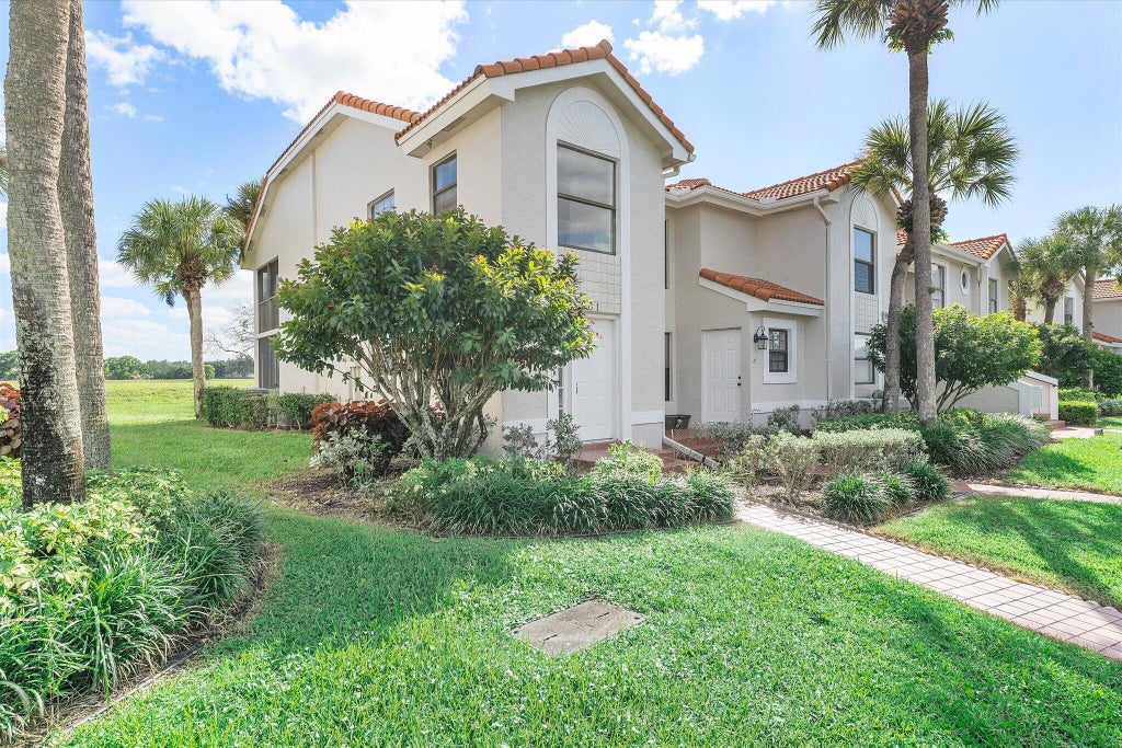Photo of 10890 Lakemore Lane #Unit 201, Boca Raton, FL 33498 (MLS # B26091928)