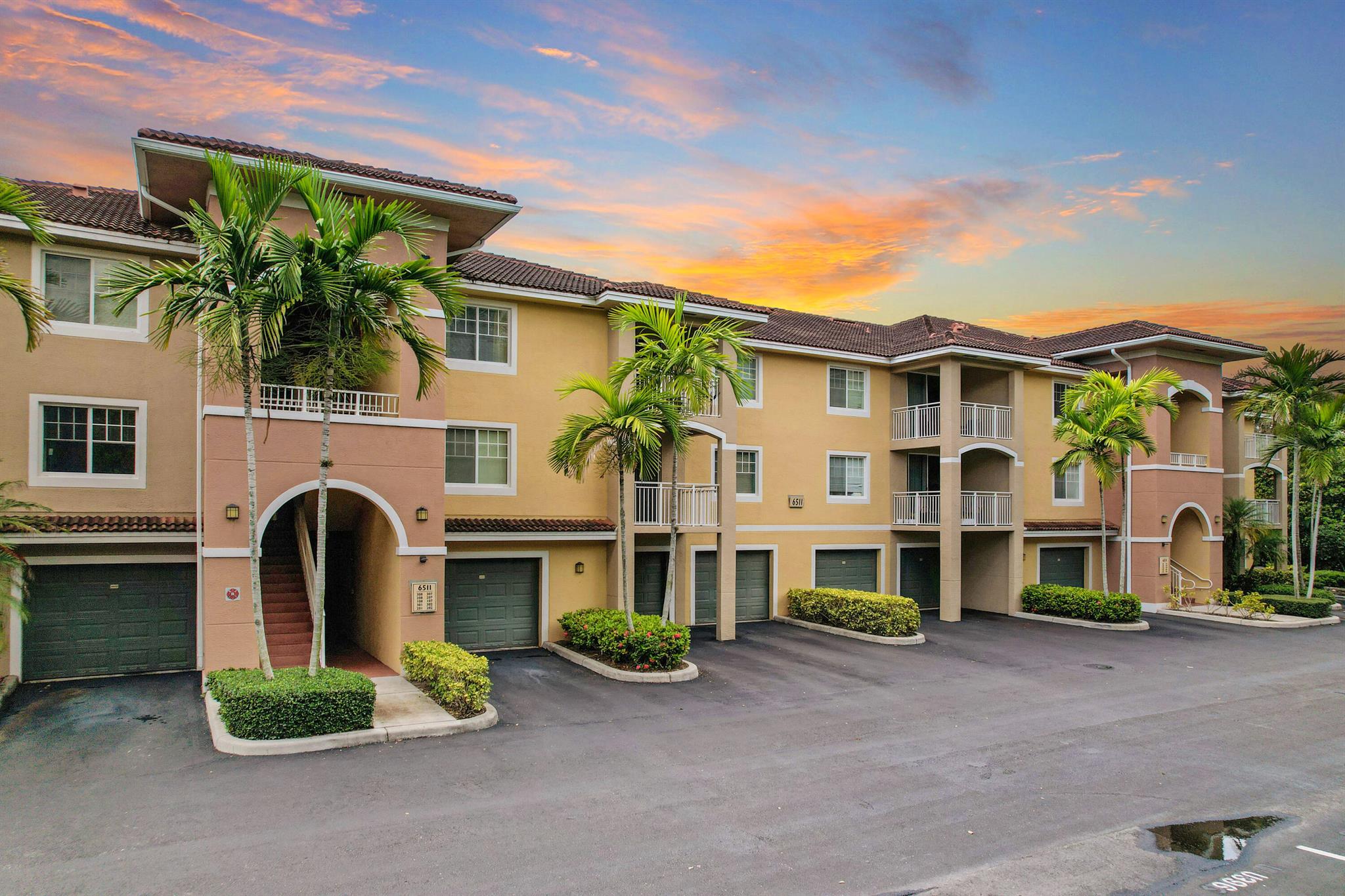 Live in the luxurious resort style community of Emerald Dunes. Centrally located to major highways, restaurants, and shopping. This ground floor unit has undergone beautiful renovations including new flooring, fresh paint, and bathroom enhancements. Offering a full size washer & dryer, walk in closets, hurricane resistant windows, and a private garage directly attached to the building. No need to run outside in the Florida rain! The ac was replaced last month. Water & cable included. Enjoy relaxing nights on your private patio with a beautiful garden view Amenities include 2 clubhouses, a spacious media room, 24/7 fitness centers,2 olympic-sized pools with bbq areas, 2 heated whirlpool spas, a yoga/stretching/aerobics room, and lighted tennis court and putting green.