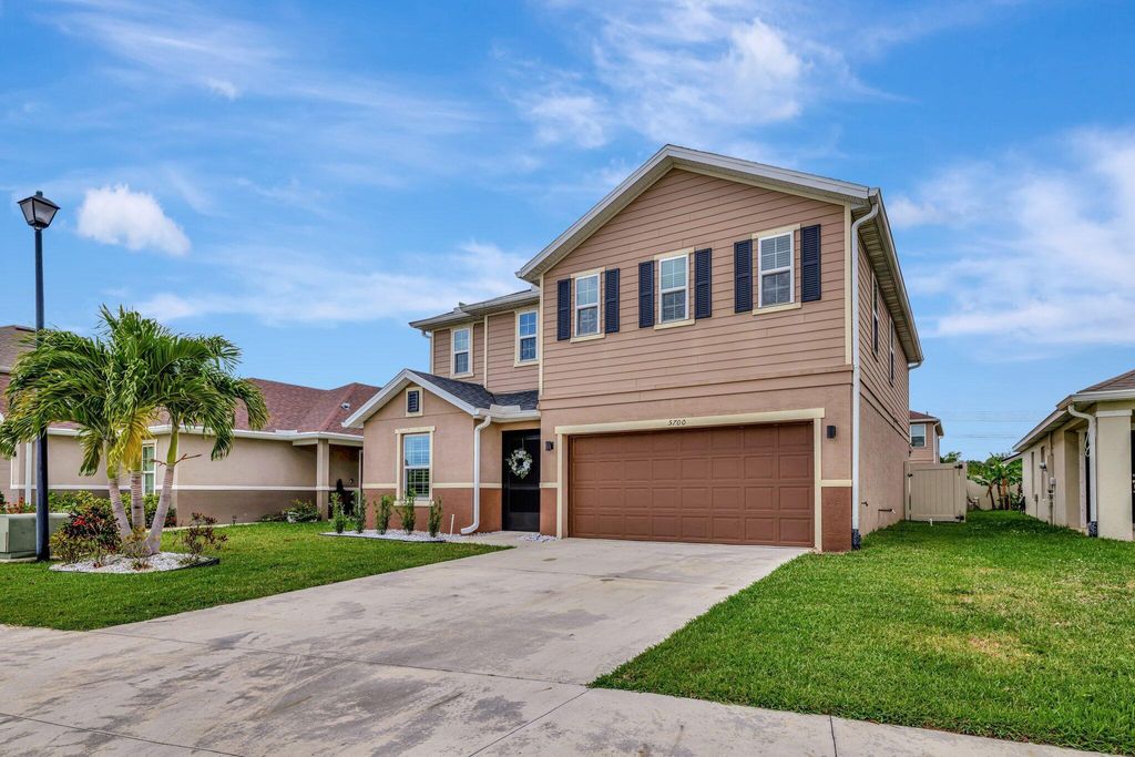 Photo of 5700 NW Pine Trail Circle, Port Saint Lucie, FL 34983 (MLS # R11088921)