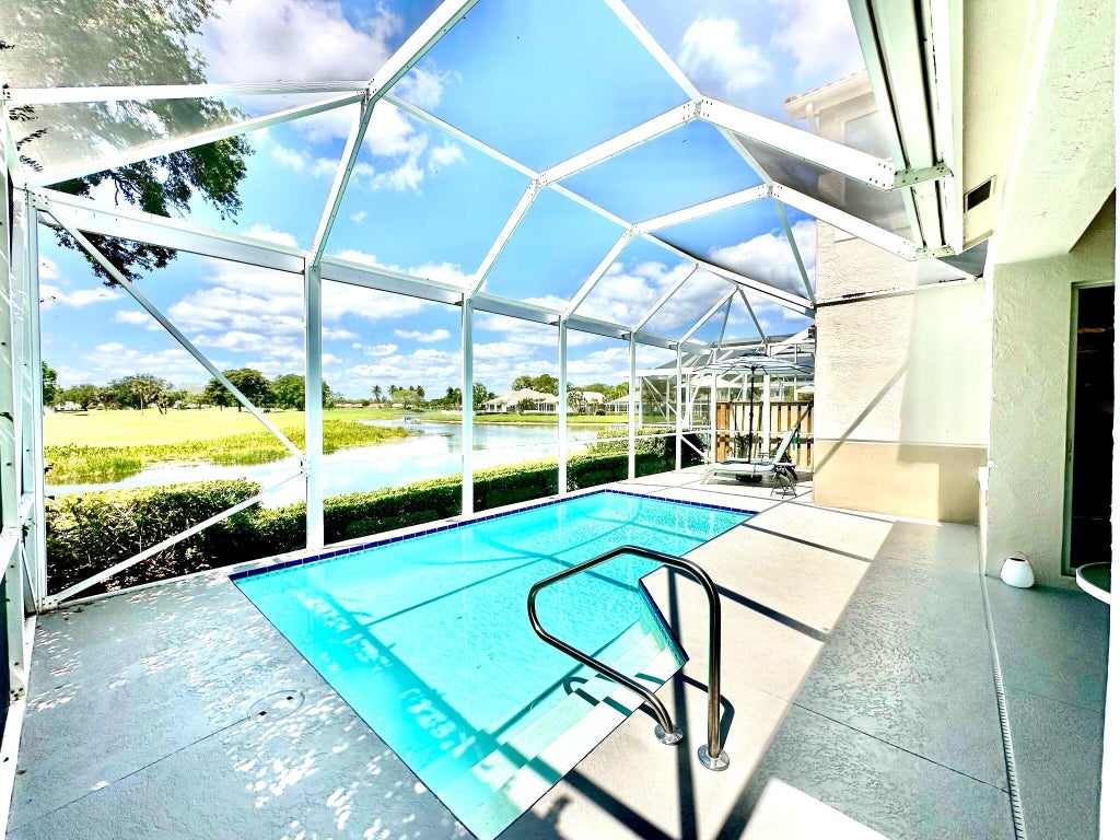 Photo of 97 Monterey Pointe Drive, Palm Beach Gardens, FL 33418 (MLS # B26083164)