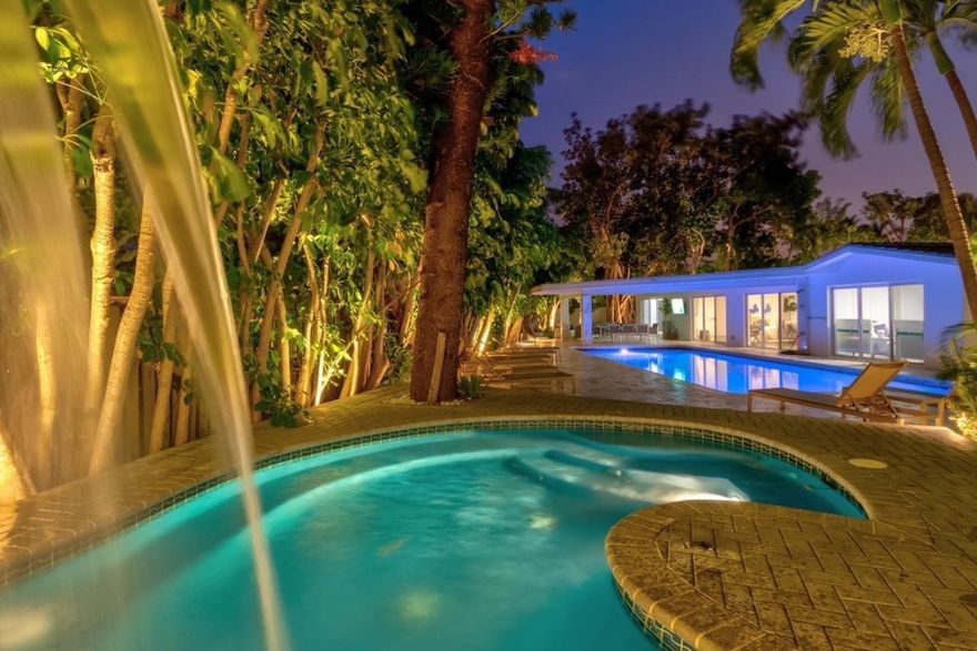 This fully stocked Vacation Rental is perfect for families & large groups. PRICING IS BASED ON DATES. LISTED PRICE IS FOR ANNUAL LEASE. RESORT STYLE 13,000 Sq Ft GATED COMPOUND w/ 4 Bedrooms / 4.5 Bathrooms. All rooms are En-Suite with lots of light! Oversized Pool, 20 PERSON HOT TUB w/ Waterfall that can also be used as a Kiddie Pool, PUTTING GREEN, CORNHOLE, Outdoor TV & Built in Kitchen, Dining Table/Seating/Lounge Chairs/Floats/BBQ/SONOS & much more. Property is located in East FTL in family friendly neighborhood across from Pier 66, walk to semi-private beach, Las Olas. Shorter term rentals available... Weekend & Weekly rentals may be considered based on availability. Rates vary based on dates/availability. Share dates, # occupants, # pets. LONG AND SHORT TERM LEASES AVAILABLE.