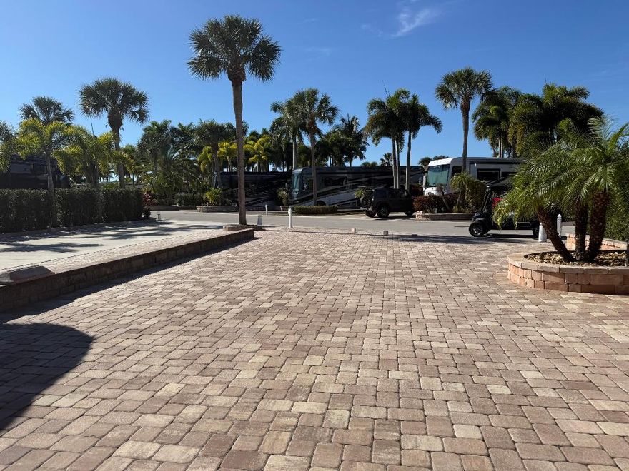 Beautiful lot in Motor Coach Resort Class A . Waterfront lot fully paved large lot with mature greenery. Plenty of room for an evening cocktail party with gorgeous view of the water and fountain, very spacious. Granite top bar with sink , fridge and cabinets. Close to the Mets stadium , shopping and dining.