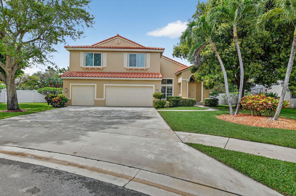 Photo of 5278 Indianwood Village Lane, Lake Worth, FL 33463 (MLS # B26007079)