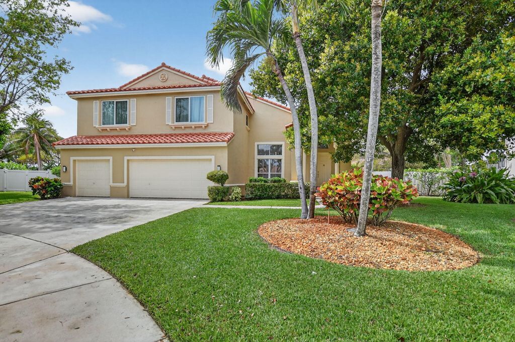 Photo of 5278 Indianwood Village Lane, Lake Worth, FL 33463 (MLS # B26007079)