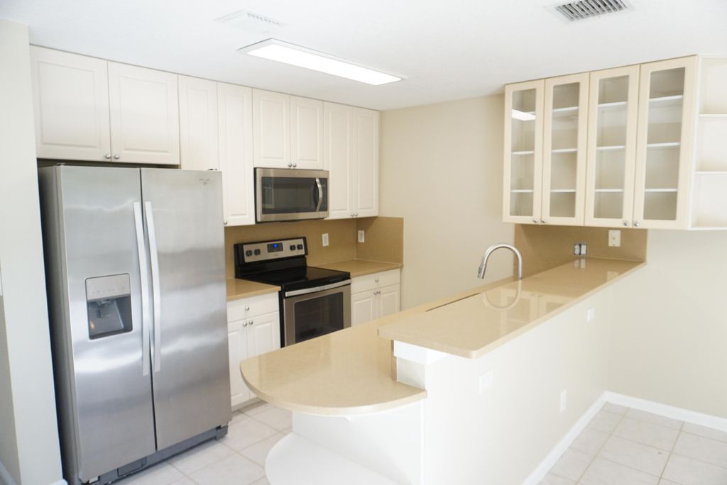 Photo of 12832 Woodmill Drive, Palm Beach Gardens, FL 33418 (MLS # B26024345)