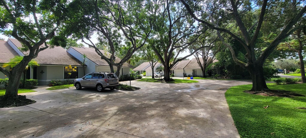 Photo of 701 Bannock Lane, Palm Beach Gardens, FL 33418 (MLS # R11018532)