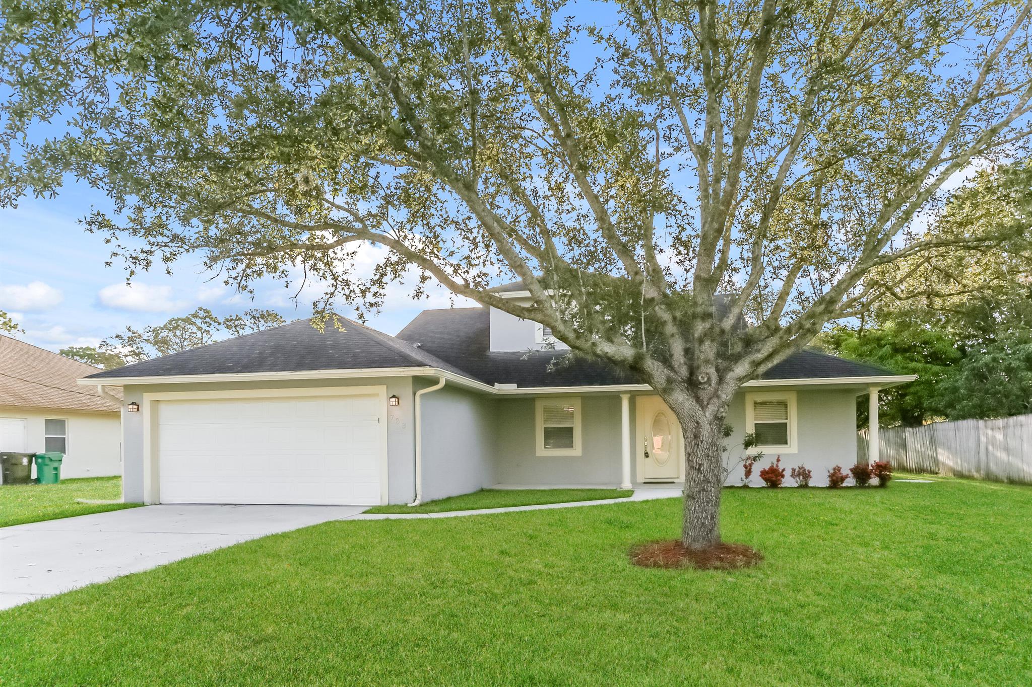 This spacious 3-bedroom, 2-bathroom pet-friendly home offers 1,850 sq. ft. of comfortable living space. The kitchen is well-equipped with stainless steel appliances, including a refrigerator, range oven, and dishwasher. Enjoy the convenience of window coverings and a ceiling fan in living areas. Relax in the bathroom's bathtub. The home also features a garage. Located close to various points of interest, including restaurants, grocery shopping, city services, and schools, this property offers a comfortable lifestyle with easy access to amenities.