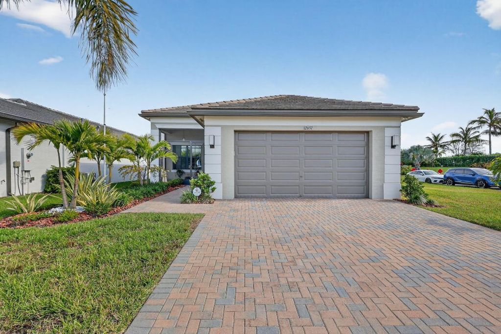 Photo of 12637 SW Alongshore Drive, Port Saint Lucie, FL 34953 (MLS # R11151705)