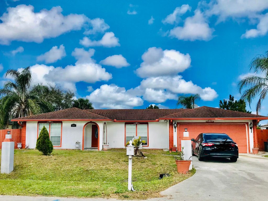 Photo of 109 NE Surfside Avenue, Port Saint Lucie, FL 34983 (MLS # R10783198)