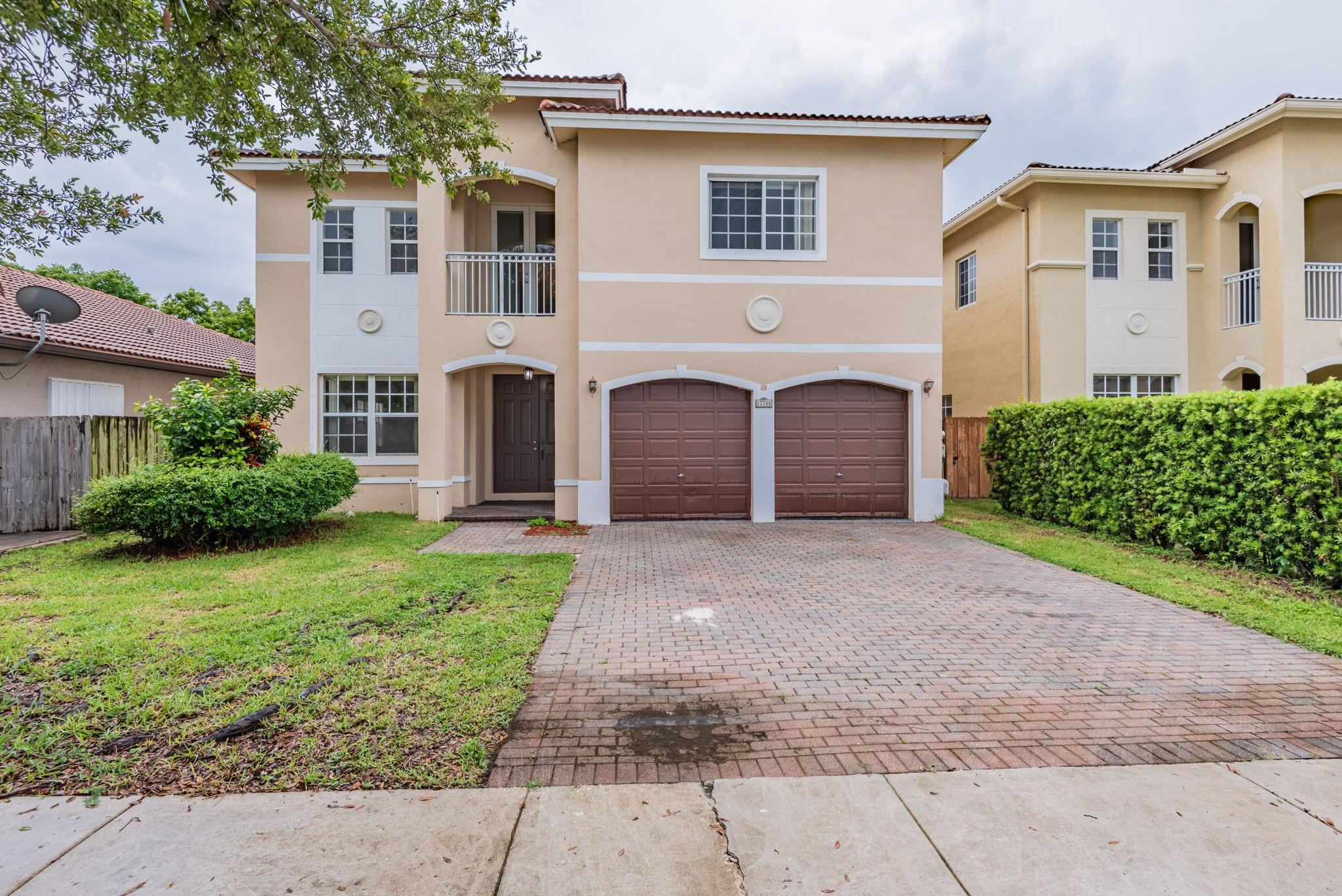 This stunning 2-story home features 5 bedrooms, 4 bathrooms, and a 2-car garage, offering ample space and comfort. The inviting layout includes a separate great room, a kitchen with breakfast nook, kitchen bar, and a living room perfect for gatherings. The spacious primary suite impresses with a private balcony overlooking the backyard, double door entry, a cozy sitting area, and a luxurious bathroom with separate bathtub, shower, and a generous spacious closet. Enjoy outdoor living in the expansive wood-fenced backyard with a covered back porch, ideal for relaxing or entertaining guests. This home blends style, comfort, and function seamlessly. Schedule a showing today!
