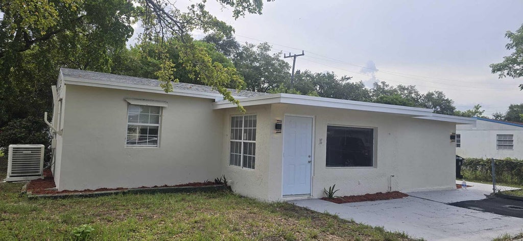 Photo of 1101 NW 23RD Terrace, Fort Lauderdale, FL 33311 (MLS # B26078447)
