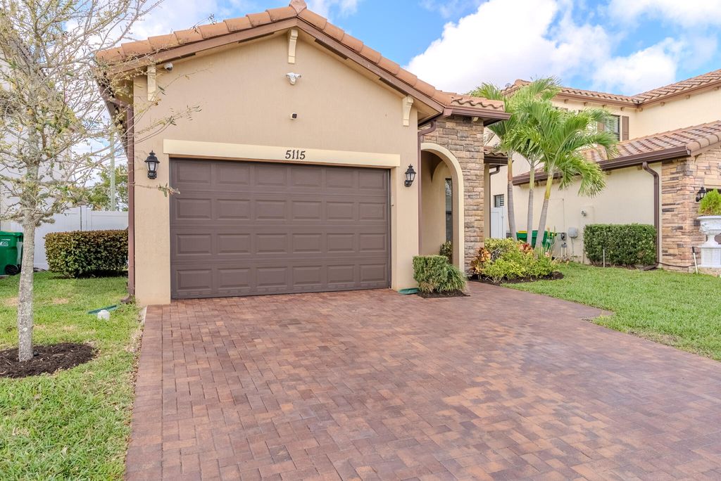 Photo of 5115 NW 51st Terrace, Tamarac, FL 33319 (MLS # B26001839)
