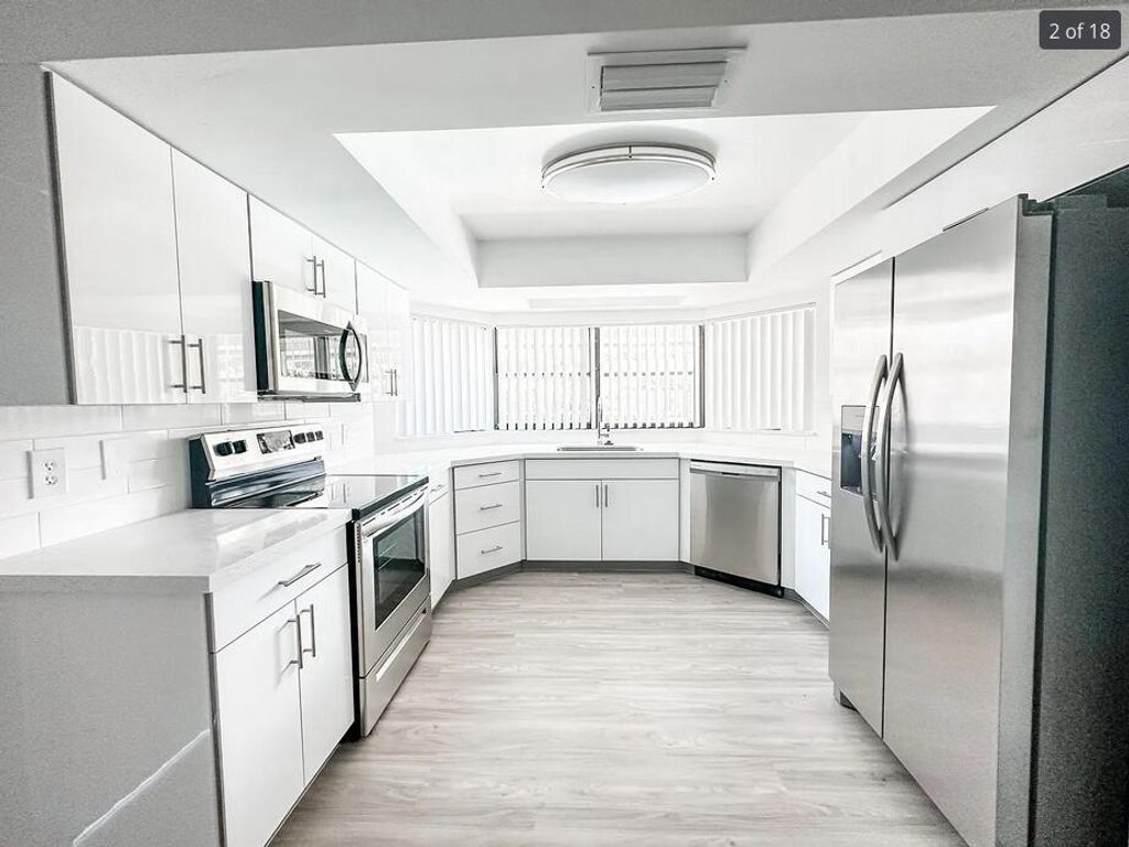 Photo of 3048 NW 27th Terrace, Boca Raton, FL 33434 (MLS # R11132332)