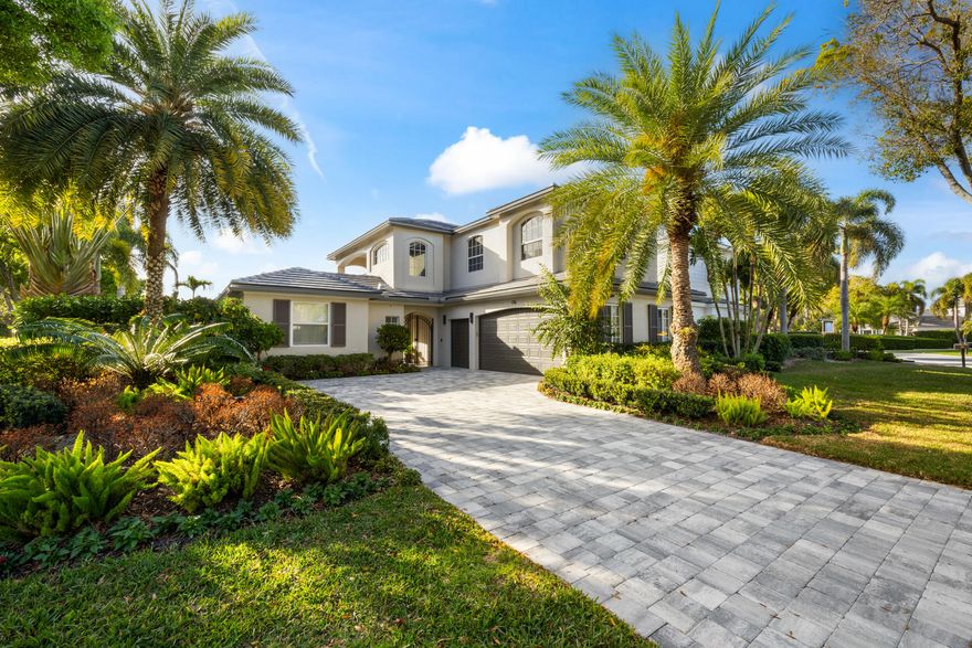 Live in one of the best-selling communities in Northern Palm Beach, offering serene lake views & seamless indoor-outdoor living. Natural light & an open floor plan create an inviting atmosphere, connecting the interior living spaces to a private courtyard with pool, covered entertaining area, & lush tropical landscaping are perfect for everyday living & relaxed gatherings. The home features a spacious living area, chef's kitchen, & an expansive primary suite complete with an oversized closet, guest house, new roof & generator. Located within the Golf Village at Admirals Cove, an intimate enclave of approximately 120 homes. Residents have access to 27 championship holes within the village, along with the club's full 45-hole offering. Amenities include a recently renovated clubhouse with multiple dining venues, fitness facilities, tennis, spa services, & an active social calendar.multiple dining venues, fitness facilities, tennis, spa services, & an active social calendar.