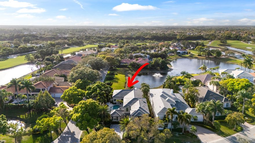 Live in one of the best-selling communities in Northern Palm Beach, offering serene lake views & seamless indoor-outdoor living. Natural light & an open floor plan create an inviting atmosphere, connecting the interior living spaces to a private courtyard with pool, covered entertaining area, & lush tropical landscaping are perfect for everyday living & relaxed gatherings. The home features a spacious living area, chef's kitchen, & an expansive primary suite complete with an oversized closet, guest house, new roof & generator. Located within the Golf Village at Admirals Cove, an intimate enclave of approximately 120 homes. Residents have access to 27 championship holes within the village, along with the club's full 45-hole offering. Amenities include a recently renovated clubhouse with multiple dining venues, fitness facilities, tennis, spa services, & an active social calendar.multiple dining venues, fitness facilities, tennis, spa services, & an active social calendar.