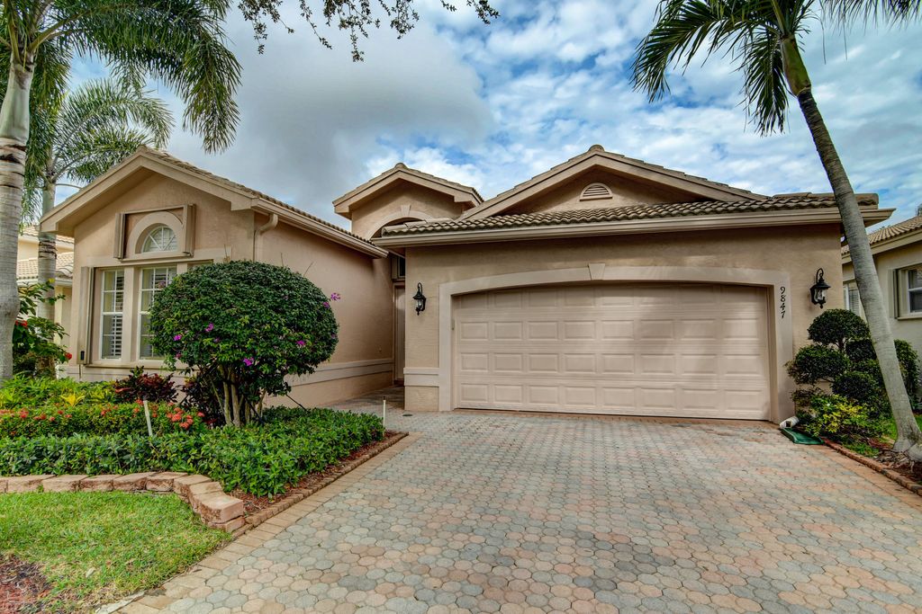 Photo of 9847 Tallyrand Drive Dr, Lake Worth Beach, FL 33467 (MLS # R10770743)