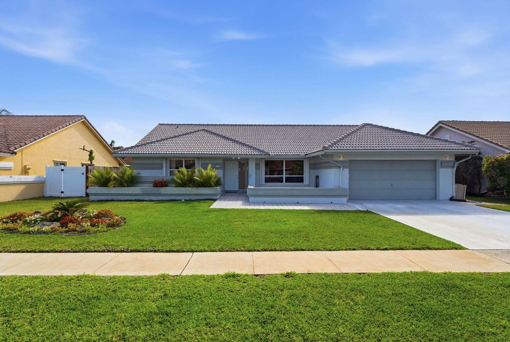 Photo of 9284 Laurel Green Drive, Boynton Beach, FL 33437 (MLS # B26016223)