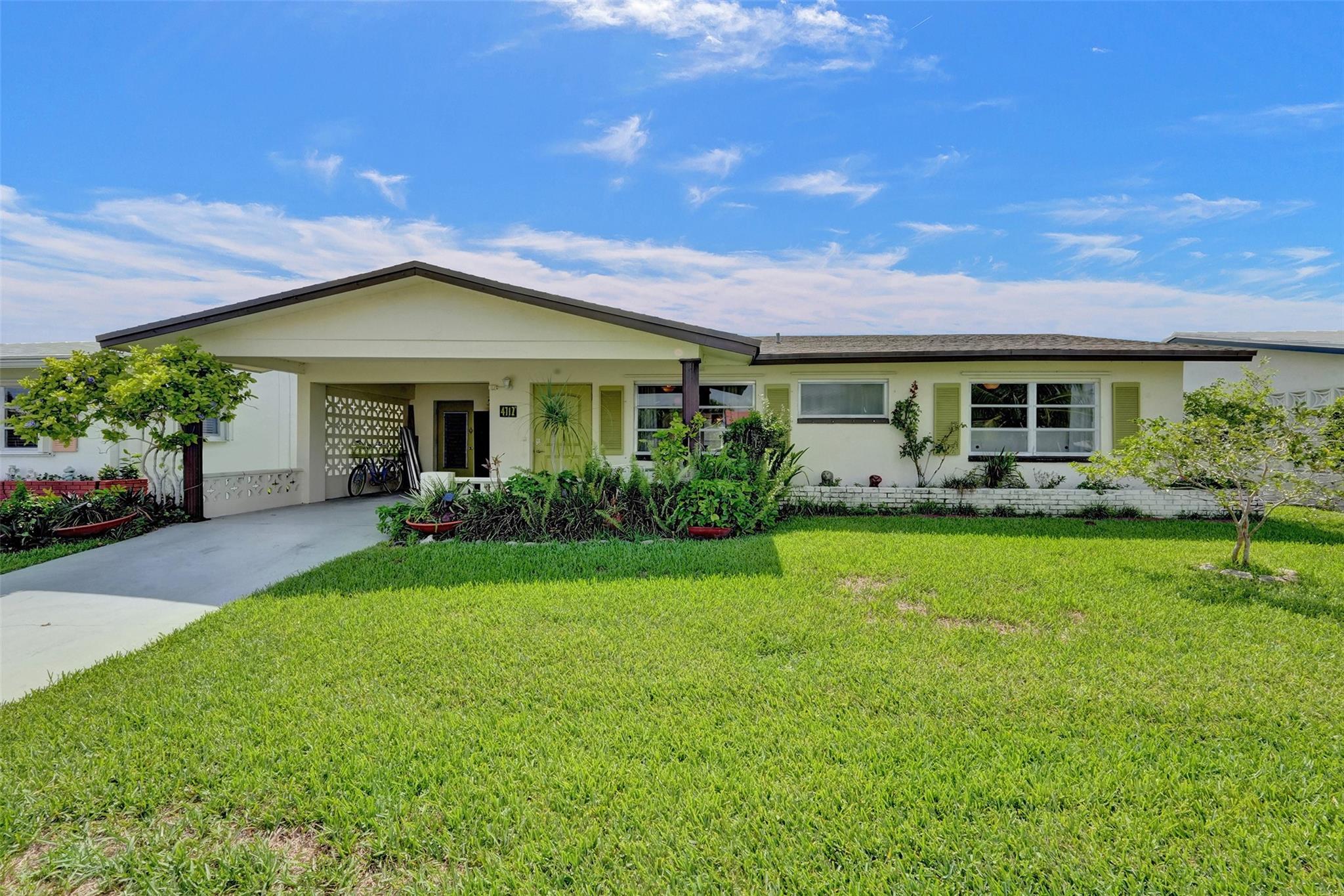 Welcome to your peaceful retreat in the Mainlands of Tamarac Lakes, a thriving 55+ community. This inviting 2-bedroom, 2-bathroom home offers a perfect blend of comfort and relaxation. Nestled on a scenic waterfront lot, the home provides stunning views of a calm canal from your large back patio—ideal for enjoying quiet mornings. Inside, the recently upgraded kitchen includes modern touches that make daily cooking a pleasure. Both bathrooms have been recently updated with contemporary fixtures. The roof was replaced 7 years ago, offering peace of mind for years to come. As part of the Mainlands of Tamarac Lakes community, you'll have access to various amenities designed for a leisurely lifestyle. This home's unique charm and thoughtful updates make it a perfect place to call home!