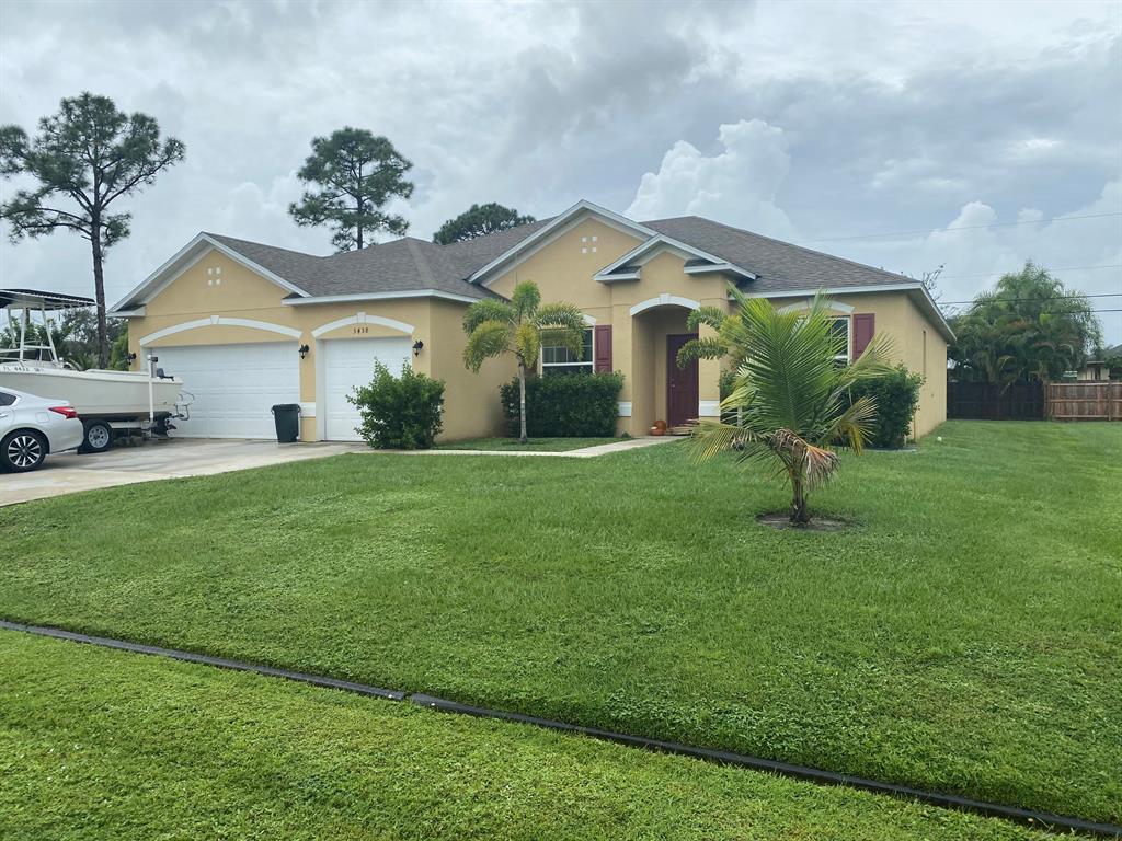 Photo of 3438 SW Funtuna Street, Port Saint Lucie, FL 34953 (MLS # R10669870)