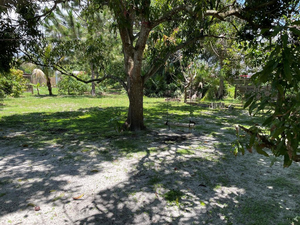 Photo of 1119 SE O'Donnell Lane, Port St Lucie, FL 34983 (MLS # R10891601)