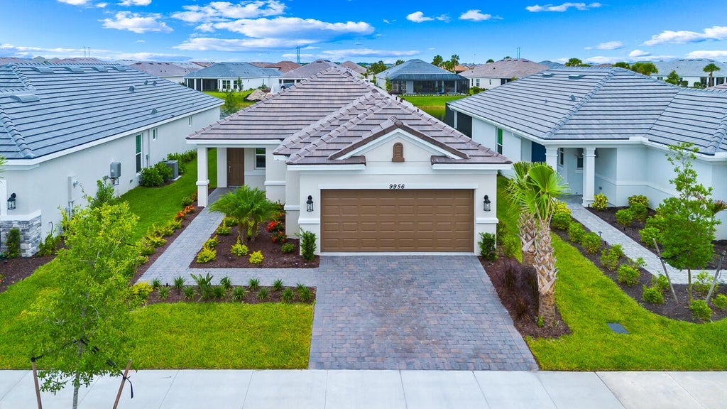 Photo of 9956 Santini Road, Port Saint Lucie, FL 34987 (MLS # B26039806)