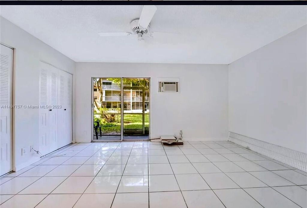 Photo of 100 SW 132nd Way #109k, Pembroke Pines, FL 33027 (MLS # B26025162)