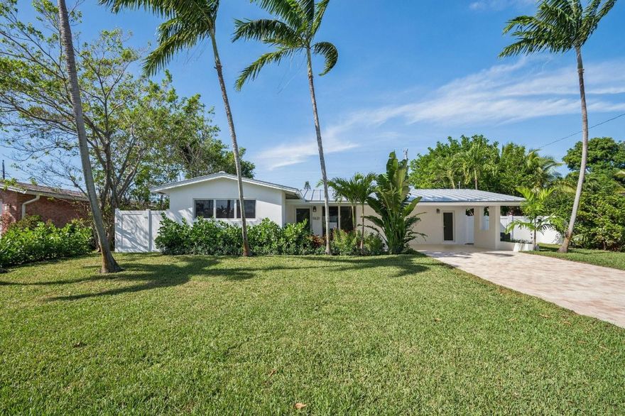Fully Renovated 3BR/2BA + Office/Den Pool Home in Coral Ridge Isles! Every inch of this beautiful home has been thoughtfully updated to deliver modern living at its finest. Step inside to a bright open layout featuring a renovated master suite, spacious flex room for an office or den, and inviting sunny living areas. Enjoy peace of mind with all-new epoxy lined plumbing, hurricane-impact windows and doors, and gas tankless hot water heater. A new roof and driveway add to the home's long-term value and curb appeal. The gorgeous kitchen shines with new appliances and stylish finishes. Outdoors, your oasis awaits with a sparkling pool, irrigation system, lush landscaping, and a white PVC fence. Move-in ready with every major system upgraded, this Coral Ridge Isles gem is the total package!