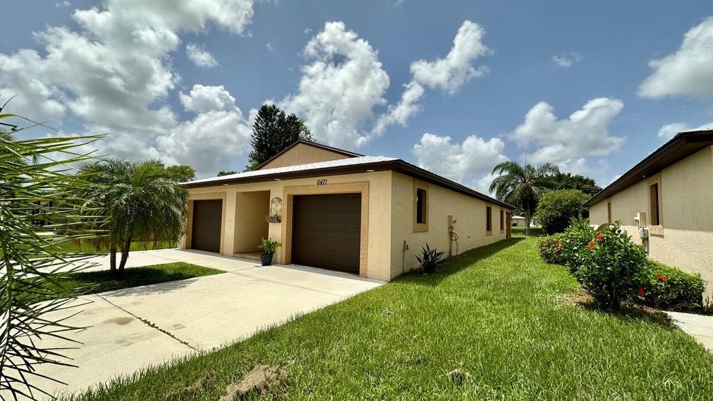 Photo of 6471 Alemendra Street, Fort Pierce, FL 34951 (MLS # R10915190)
