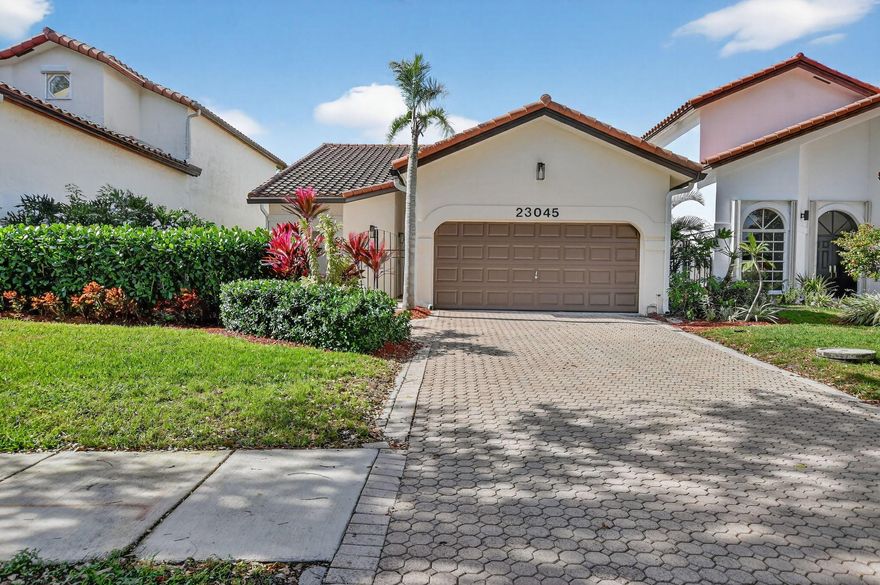 Welcome to this beautifully maintained residence in the sought-after Boca Pointe community in central Boca Raton. This sun-filled home offers 2 bedrooms plus a den, 1,644 sq. ft. of living space, and a 2-car garage, all in pristine, move-in-ready condition. Enjoy abundant natural light throughout and a huge, private backyard--perfect for outdoor living and large enough to add your dream pool. The thoughtful layout provides flexible living space for a home office, guest room, or cozy den. Ideally located just a short walk to the community pool, this home combines comfort, privacy, and convenience in one of Boca Raton's most desirable developments. Don't miss this opportunity to own this bright, spacious home.