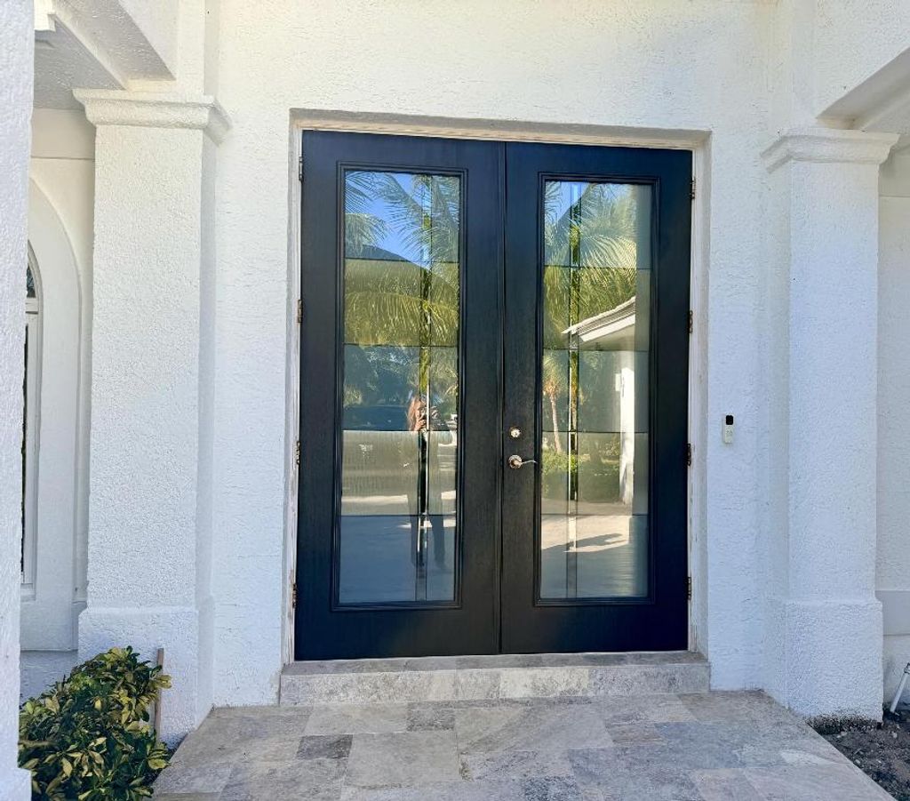 Photo of 8601 S Ocean Drive, Jensen Beach, FL 34957 (MLS # R11152009)