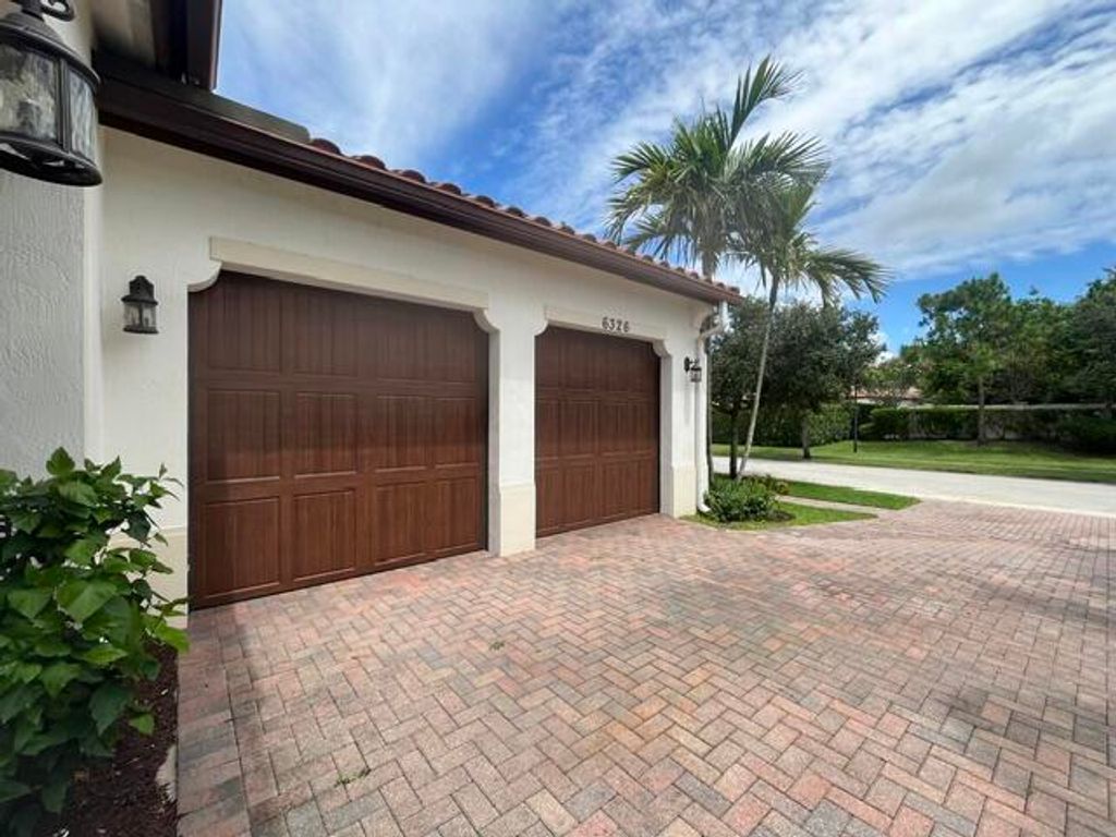 Photo of 6326 Grebe Court, Lake Worth, FL 33463 (MLS # B26037577)