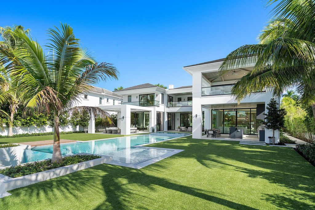 Photo of 415 E Alexander Palm Road, Boca Raton, FL 33432 (MLS # R10930411)