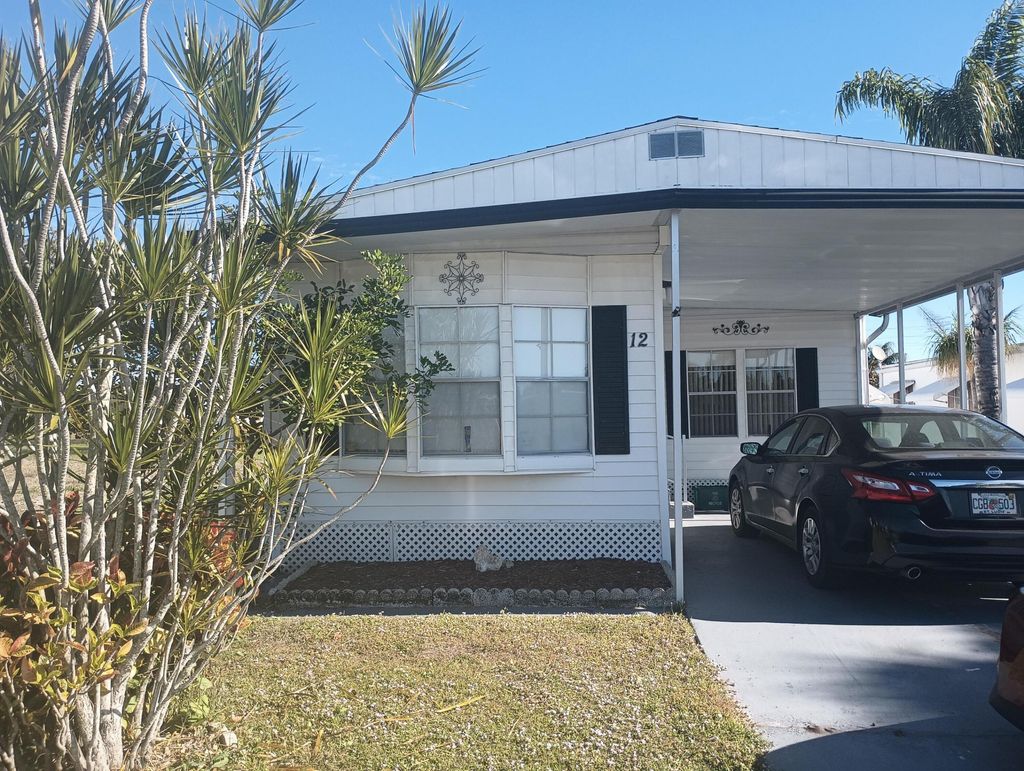 Photo of 12 Universidad Lane, Port Saint Lucie, FL 34952 (MLS # R11153995)