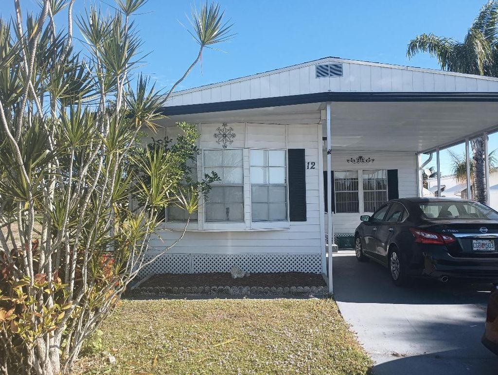 Photo of 12 Universidad Lane, Port Saint Lucie, FL 34952 (MLS # R11153995)