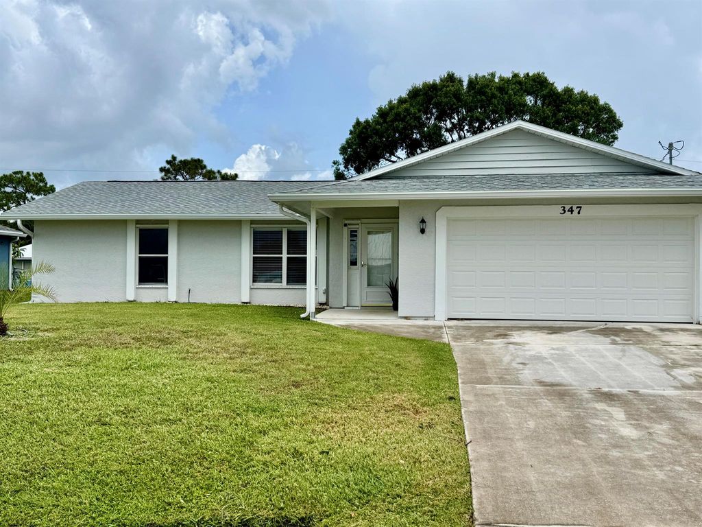 Photo of 347 SW Duxbury Avenue, Port Saint Lucie, FL 34983 (MLS # R11101033)